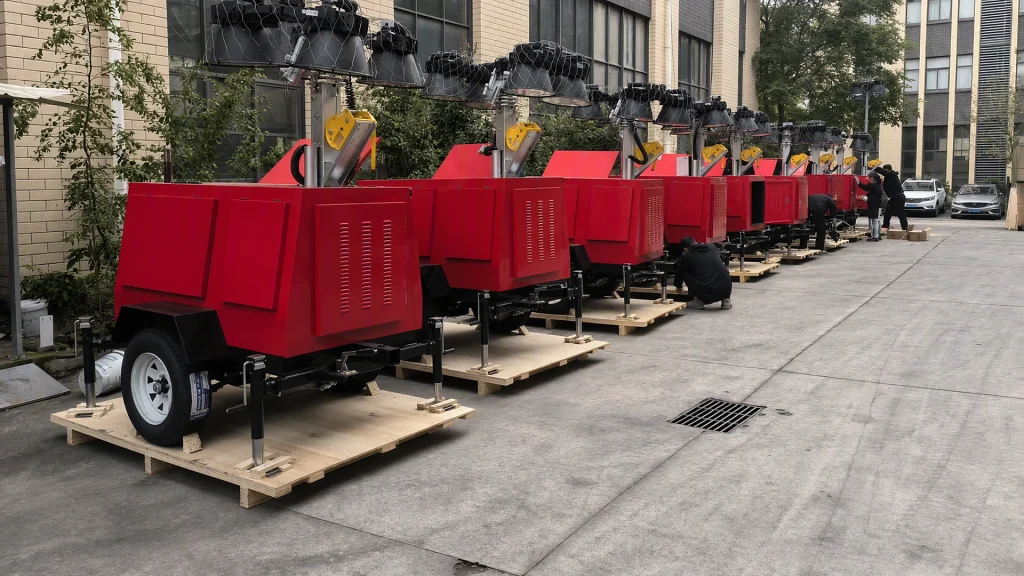 Yuji compact portable telescopic floodlight carts ready for export in factory staging yard